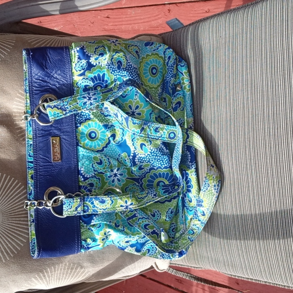Hadaka purse blue with floral designs measures 12 by 16" excellent condition